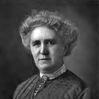 Mary Reed, The Richest Widow in Colorado [1893-1901] Formal studio portrait  of Marjorie (Mrs. Verner Z.) Reed in fashionable dress sitting in ornate  carved chair in photographer's studio. "Chas. E. Emery Colorado