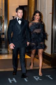 A whirlwind romance followed by an extravagant wedding ceremony pictures of priyanka chopra with an apparent baby bump from her recent appearance at michael kors fashion show is adding fuel to pregnancy news. Priyanka Chopra Puts A Stylish Spin On The Lbd For Joe Jonas 30th Birthday Harper S Bazaar Arabia