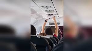 In a video going viral on the internet, you can see a woman drying her underwear on ac vent in a flight. Video Woman Dries Underwear Inside A Packed Flight Trending News The Indian Express