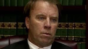 Trial is set for lawsuit against Cooper