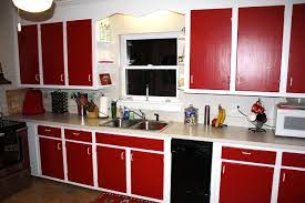 Navy blue cabinets and white appliances The Guest Post The Pollock Potluck Red Cabinets Red And White Kitchen Cabinets Red Kitchen Walls