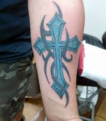 The cross is filled with loops, flowers of knots, and pointed tips, while the circle across the intersection is filled with the tiniest of details. Tattoos Design Ideas 32 Best Attractive Cross Tattoos Design Ideas For Men