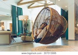 Essential home is the ultimate combination of retro design and contemporary details. Woman Sleeping In Swing Chair In Beautiful Home Interior Home Decor Design Luxury Home Decor Interior Home Decoration With Swing Chairs Relaxing In Beautiful Home Interior Home Decor Poster Id 307313995