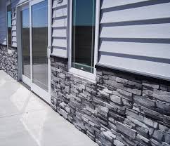 Pin By Natural Concrete Products On Adorn Mortarless Stone Veneer Brick Exterior House Stone Siding Exterior Grey Stone House