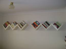 This Is My Ikea Lack Wall Mounted Book Shelves I Love The Look Of Them Particularly The Way The B Wall Bookshelves Ikea Wall Shelves Wall Mounted Bookshelves