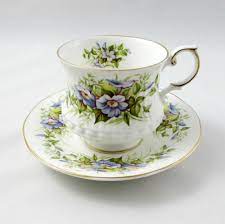 Vintage Bone China Tea Cup And Saucer By Queen S Rosina China Tea Cup Is White With Ribbing And Decorated With W Tea Cups Tea Cups Vintage Bone China Tea Cups