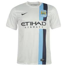 Colin in a famous dark blue number from the 70s. Manchester City Away Kit 2013 14
