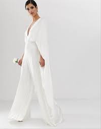 33 Bridal Jumpsuits And Rompers For Your Elopement Or Minimony Top Wedding Dress Designers Wedding Jumpsuit Bridal Jumpsuit