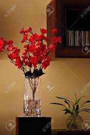 Romantic collection of modern vases with flowers for your design. Modern Interior Room Decoration With Artificial Red Flowers In Stock Photo Picture And Royalty Free Image Image 143290991