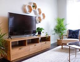 How do you hang a shelf on a tv? Tv Stand Decor Ideas For Your Living Room Hayneedle