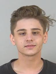 20-year-old JOHN LANDRY from TAVARES FL was booked