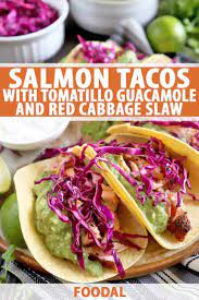 Drizzle with a little olive oil, add cilantro and season with salt and pepper, to taste. Salmon Tacos With Tomatillo Guacamole And Red Cabbage Slaw Recipe Red Cabbage Slaw Salmon Tacos Seafood Recipes Healthy