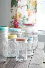 Musical mason jar lid christmas ornaments. Recycled Food Jars Turned Storage Jars With Glass Knob Tops