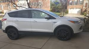 Image result for Oxford White 2001 Escape