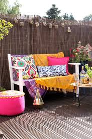 Eclectic Boho Glam Garden Reveal Swoon Worthy Boho Textiles On White Bench Outdoor Decor Oak Furniture Land Patio Decor
