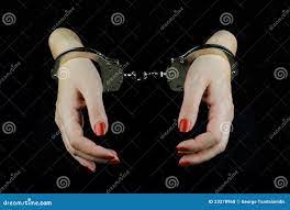 Handcuffed woman hands stock photo. Image of chained - 23378968