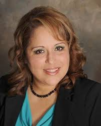 Mary Carmen De La Vega, Real Estate Agent