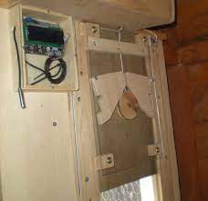 I built this chicken coop last summer and have been loving my chickens but i don't like having to come out first thing every morning and every evening to coop and uncoop them. Diy Automatic Chicken Coop Door Opener My Chicken Coop Plans