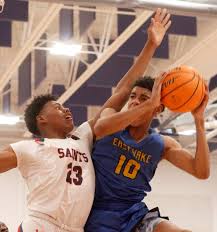 Saints' girls survive lethargic effort, turnovers