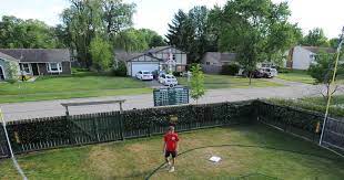 The distance from home plate to the foul poles should be between 80 and 105 feet. Palatine Teen Creates Backyard Wrigley Field For Ultimate Wiffle Experience