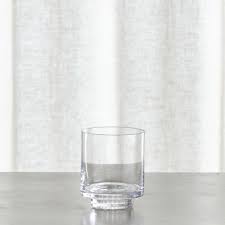 Set of three glass hurricane candles with metal bases for candles. Taylor Small Glass Hurricane Candle Holder Crate And Barrel