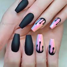 Coffin nails are basically very long shaped nails, resembling the design of a traditional coffin, if you look closely. Coffin Tip Nails