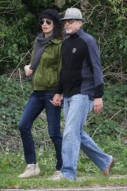 George and amal clooney arrive to dinner on a speedboat in lake como. George And Amal Clooney Celebrate Arrival Of Twins Casual Sporty Outfits Amal Clooney Casual