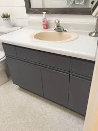 **disclosure information** i felt like i had read the directions for this product a million i want to paint our bathroom counter tops, however the sinks are fitted in separately and are already white porcelain. Bathroom Update How To Paint Laminate Cabinets The Penny Drawer