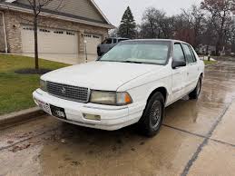 Image result for Medium Driftwood 1996 Chrysler