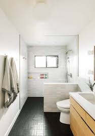Bright colors such as blue, red and yellow are not commonplace in the bathroom and will not be the shining star anytime soon. Bathroom Of The Week In La A Softer Take On Black And White Remodelista Bathroom Trends Bathroom Design Trends Bathroom Design