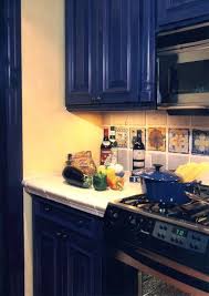 The kitchen is just beyond the black and white staircase when you walk into the house, so basically, the cabinets are one of the first things you're able to see from the entryway. Cabinet Colors For Dark Appliances Kitchen Tiles Design Trendy Kitchen Backsplash Kitchen Design