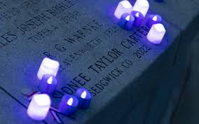 Candlelight vigil at Statehouse honors Kansas officers killed in the line  of duty • Kansas Reflector