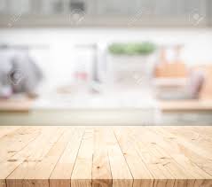 Wood table in blurry background of modern restaurant room or coffee shop for product display mockup. Wood Table Top On Blur Kitchen Counter Room Background For Montage Stock Photo Picture And Royalty Free Image Image 131789412