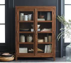 This mini beer fridge is simply designed with a black cabinet finish and stainless steel trimmed door. Menlo 49 X 67 Reclaimed Teak Storage Cabinet Pottery Barn