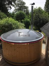 Badezuber Gfk Larche Mit Integriertem Ofen Wellness Deluxe Roy Eggersdorf Deutschland 1 700x933 Badezuber Gfk Larche Mit Integriertem Badezuber Baden Badetonne