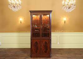 Try installing under cabinet lighting. Antique Reproduction Hepplewhite Corner China Cabinet