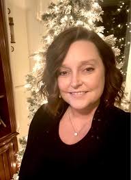 Who can take photos for a couple in Siesta Key?