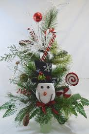 Most cemetery flowers are not at the grave all that long. No C1110 Holiday Christmas Tree Cemetery Cone Vase Arrangement Tombstone Saddle Cemetery Fl Cemetery Decorations Winter Floral Arrangements Christmas Flowers