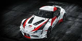 Overhead View Of Red White And Black Toyota Gr Supra Concept On Black Asphalt New Toyota Supra Toyota Supra Japan Cars