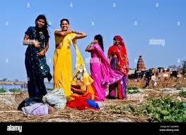 Indian women having bath in hi-res stock photography and images - Alamy