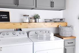 It is designed to be the height of a standard washer and dryer. Stylish Ways To Take Full Advantage Of Your Laundry Shelves 954bartend Info