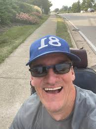 Does anyone remember the holiday waving guy? He lived across the street  from the mall well I guess it was the florist at the south end. Well, he  was a fixture waving