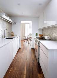 Creating a truly modern feel is a great way to turn a narrow kitchen into a chic space for entertaining friends. Modern Small Narrow Galley Kitchen Ideas Novocom Top