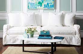 Throw pillows for a red sofa in warm and cold shades. Your Guide To Styling Sofa Throw Pillows