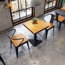 Metal dining room table and chairs victorian trading company. Durable Modern Metal Black Dining Room Furniture Cafe Chairs And Tables China Dining Table Dining Table Set Made In China Com