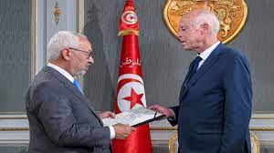 وفي وقت لاحق، أكدت الصفحة الرسمية لرئيس حزب النهضة الخبر قائلة تأكدت إصابة رئيس مجلس نواب الشعب الاستاذ راشد الغنوشي، بفيروس. Ù‚ÙŠØ³ Ø³Ø¹ÙŠØ¯ ÙÙŠ Ù…ÙˆØ§Ø¬Ù‡Ø© Ø±Ø§Ø´Ø¯ Ø§Ù„ØºÙ†ÙˆØ´ÙŠ ÙÙ…Ù† Ø³ÙŠØ­Ø¯Ø¯ Ø¥Ø¯Ø§Ø±Ø© Ø§Ù„Ø¹Ù„Ø§Ù‚Ø§Øª Ø§Ù„Ø®Ø§Ø±Ø¬ÙŠØ© Ø§Ù„ØªÙˆÙ†Ø³ÙŠØ© Euronews