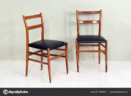 pair of retro kitchen chairs with wood