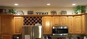 I hope this helps you decide how to decorate the top of your kitchen cabinets. Lovely Greenery Above Kitchen Cabinets Kitchen Design Photo Above Kitchen Cabinets Kitchen Cabinets Decor Cabinet Decor