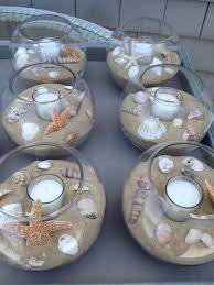 Diy Beach Themed Wedding Table Center Pieces Seashells Sand Tea Light Candles Glass Bowls Ma Idee De Decoration Centre De Table Mariage Fetes Hawaiennes