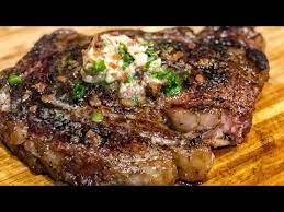 Follow a pan fried steak recipe to sear the outside of the steak while keeping the inside of the cut moist and tender. Reverse Seared Ribeye With Scallion Bacon Butta Youtube
